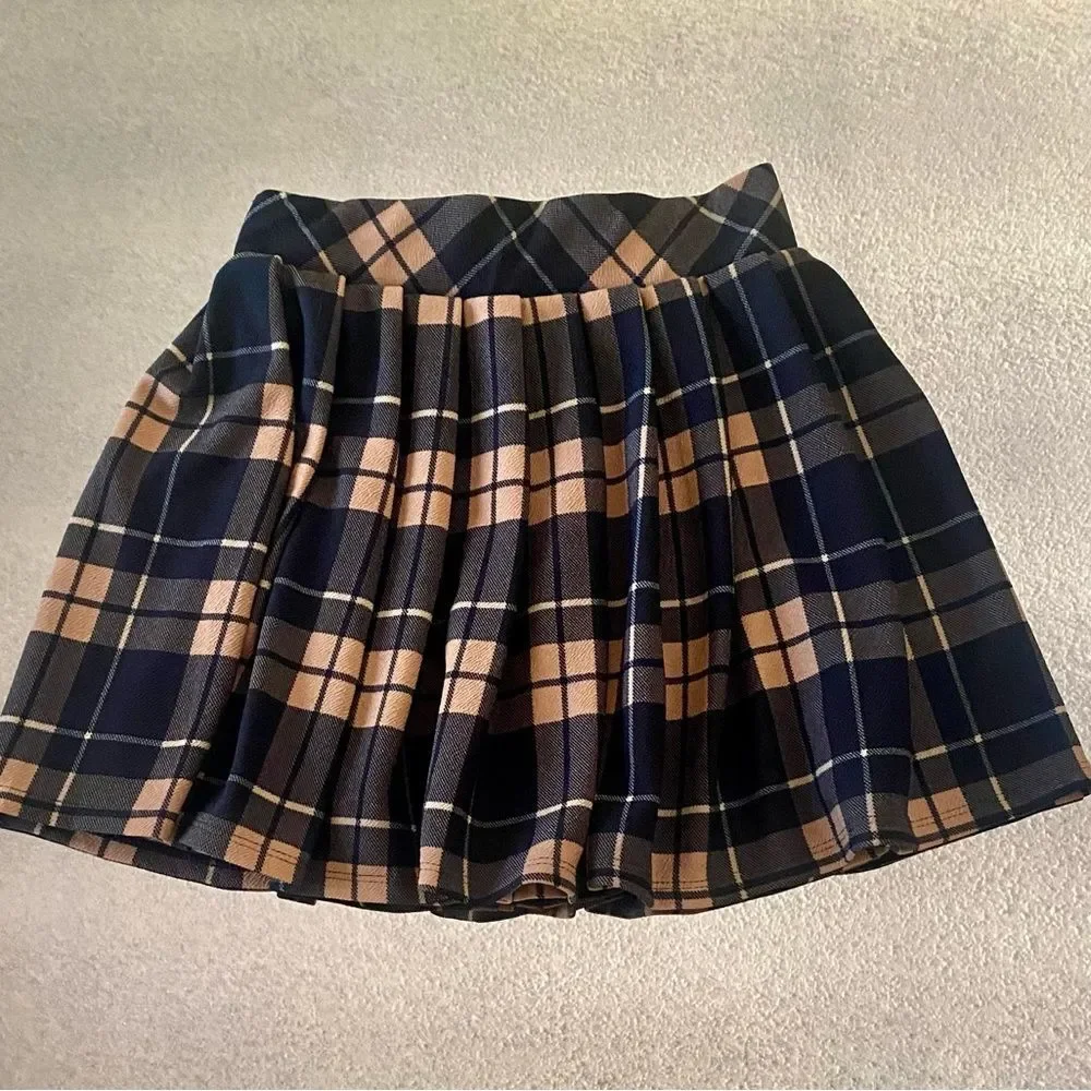 Bundle of pleaded plaid mini skirts